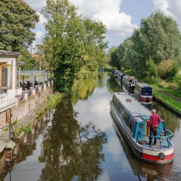 Narrow boats next to a pub